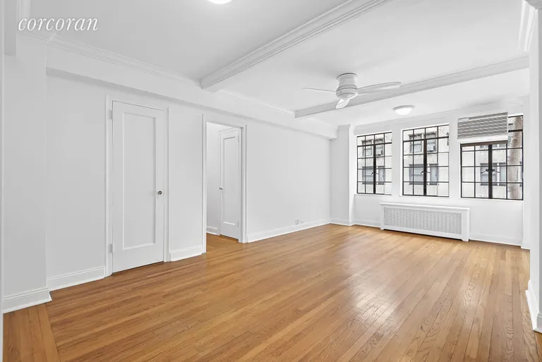 New York City Real Estate | View 321 East 43rd Street, 209 | South facing 21 foot long living room | View 2
