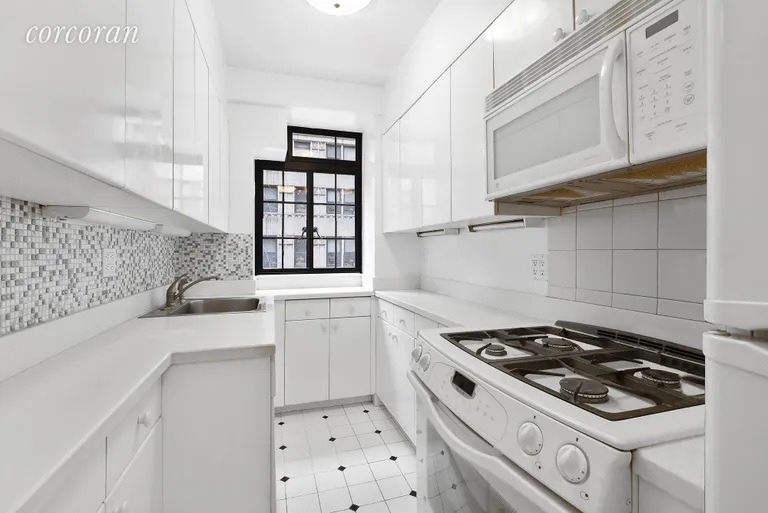 New York City Real Estate | View 321 East 43rd Street, 209 | Dining alcove is adjacent to the galley kitchen | View 3