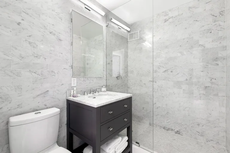 New York City Real Estate | View 45 West 67th Street, 27C | Mint renovated bath with Waterworks fixtures | View 6