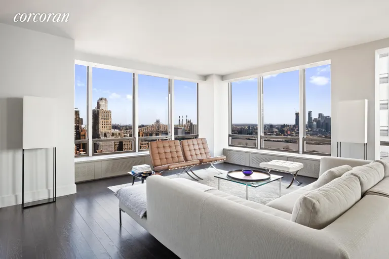 New York City Real Estate | View 860 United Nations Plaza, 27B | Living Room with Magnificent views | View 2