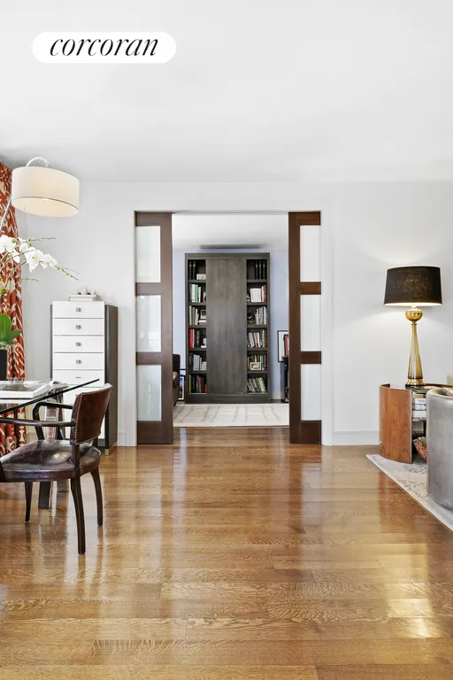 New York City Real Estate | View 203 East 72nd Street, 5B | Pocket French doors leading to Library/3rd Bedroom | View 5
