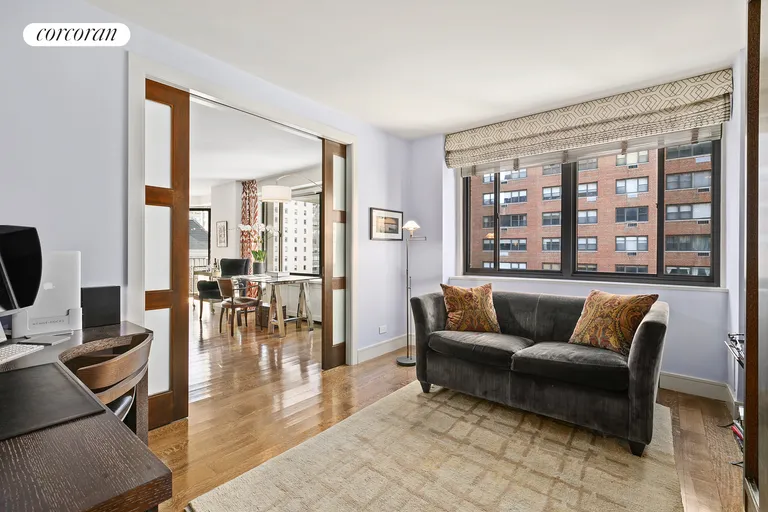 New York City Real Estate | View 203 East 72nd Street, 5B | Library/3rd Bedroom with custom lit bookcase | View 6