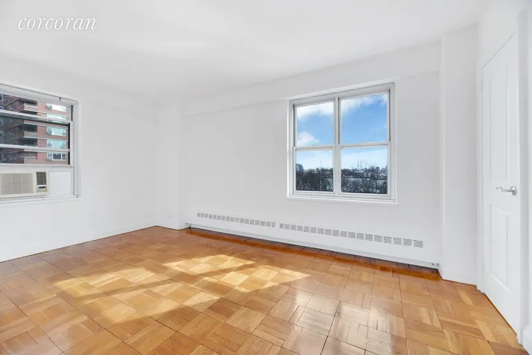 New York City Real Estate | View 577 Grand Street, F601-602 | Corner Bedroom with East River views | View 5