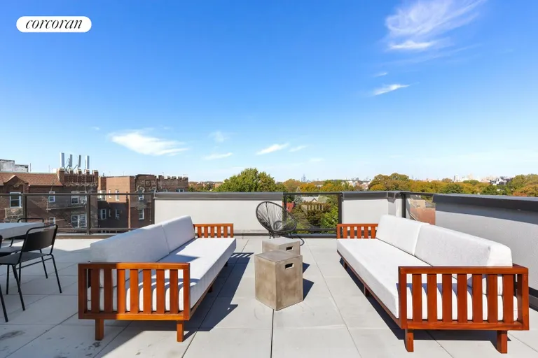 New York City Real Estate | View 1702 Newkirk Avenue, 5A | Common roof deck w/ 3 seating areas + 2 gas grills | View 9