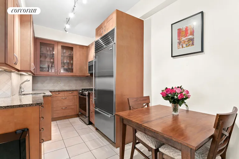 New York City Real Estate | View 229 East 79th Street, 8C | Renovated Kitchen with Sub-Zero | View 6