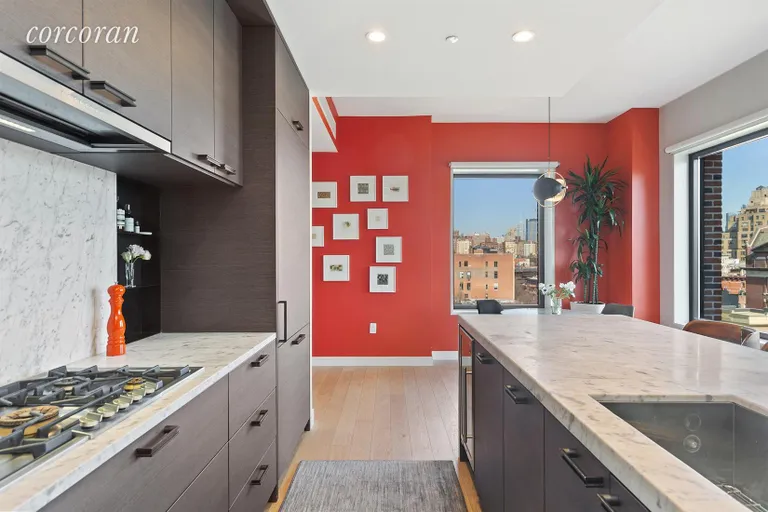 New York City Real Estate | View 100 Barrow Street, 9B | Open Chef's Kitchen | Carrera Marble Throughout | View 6