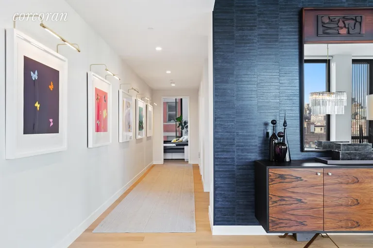 New York City Real Estate | View 100 Barrow Street, 9B | 28-foot Grand Hallway | Gallery Wall | View 9