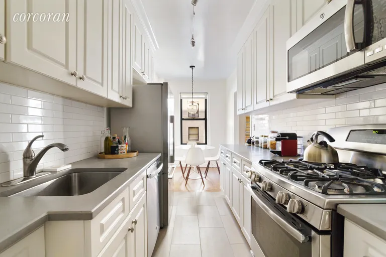 New York City Real Estate | View 875 West End Avenue, 7D | Eat in kitchen with high quality appliances   | View 4