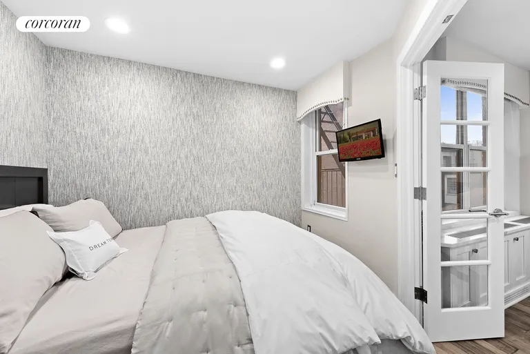 New York City Real Estate | View 350 BLEECKER STREET, 4U | Bedroom w Queen Bed and storage | View 4