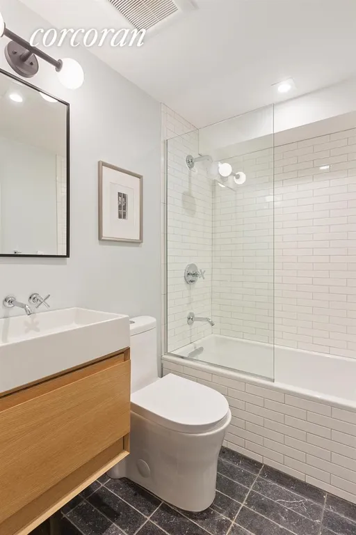 New York City Real Estate | View 83 Gates Avenue | Bathroom | View 10