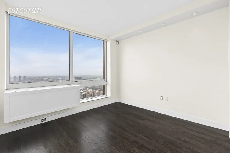 New York City Real Estate | View 215-217 East 96th Street, 40H | Bright and Airy Third Bedroom | View 7