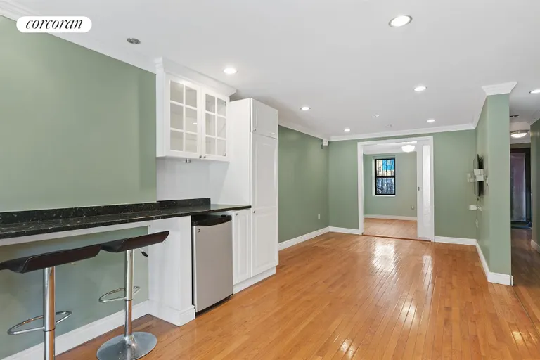 New York City Real Estate | View 474A 16th Street | Open and flowing garden level | View 11