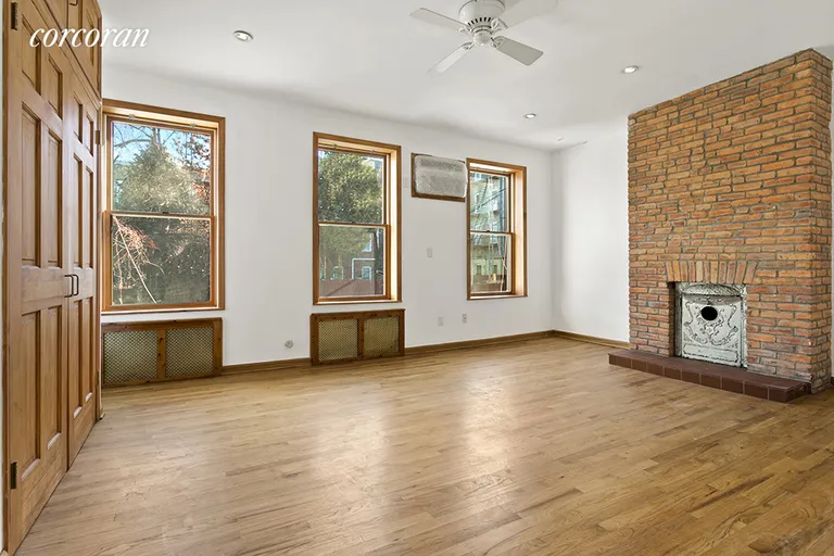 New York City Real Estate | View 196 Monitor Street, 1 | Exposed brick, garden view, dual closets  | View 3