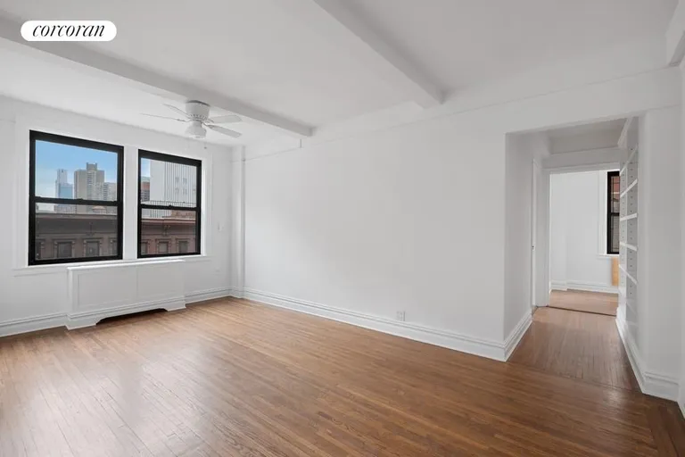 New York City Real Estate | View 457 West 57th Street, 702 | South Facing Living Room | View 2