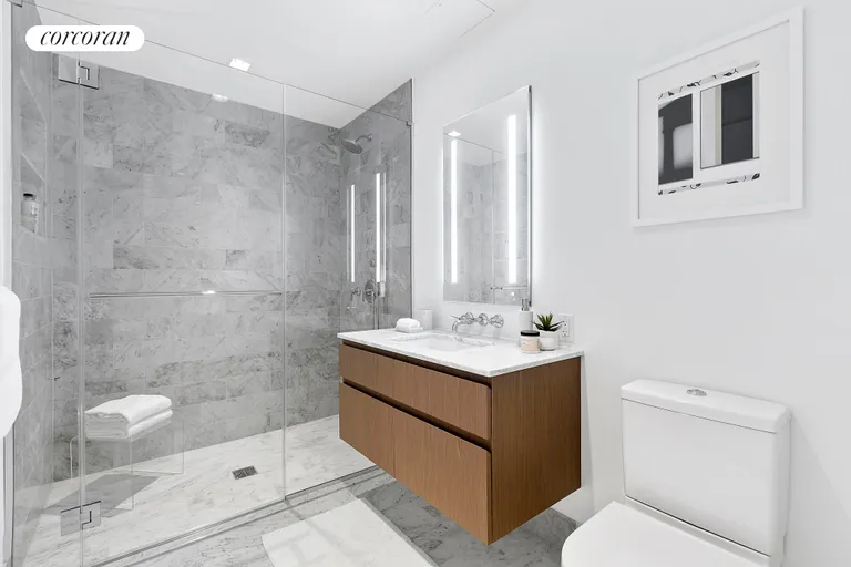 New York City Real Estate | View 27 North Moore Street, 10/11B | Second Full bathroom with walnut vanity | View 15