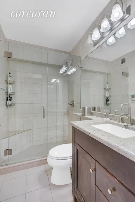 New York City Real Estate | View 45 East 25th Street, 17D | Pristine bathroom with huge stall shower! | View 5
