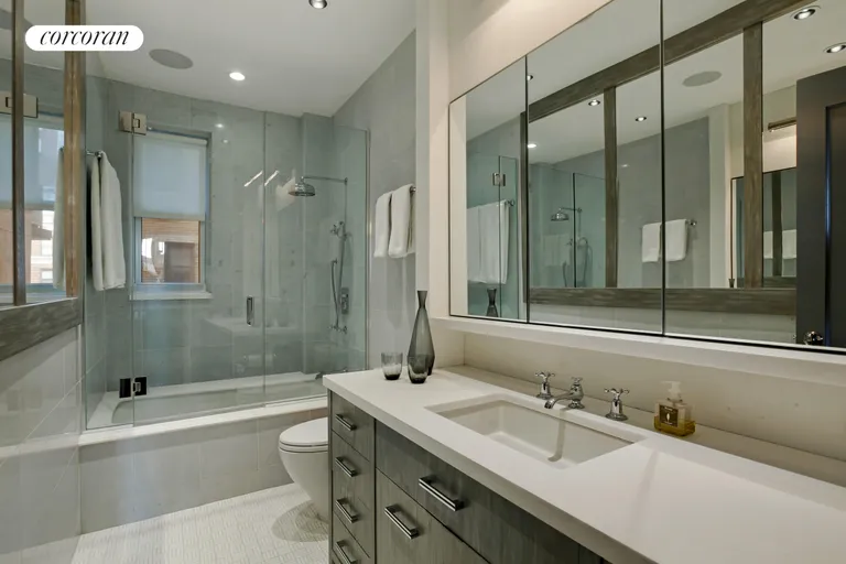 New York City Real Estate | View 108 East 86th Street, 12S | Windowed Master Bathroom  | View 8