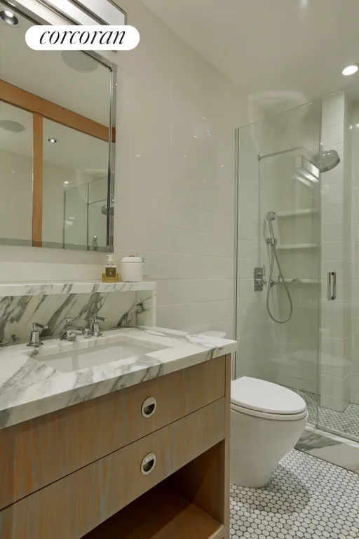 New York City Real Estate | View 108 East 86th Street, 12S | Window Second full bathroom | View 10