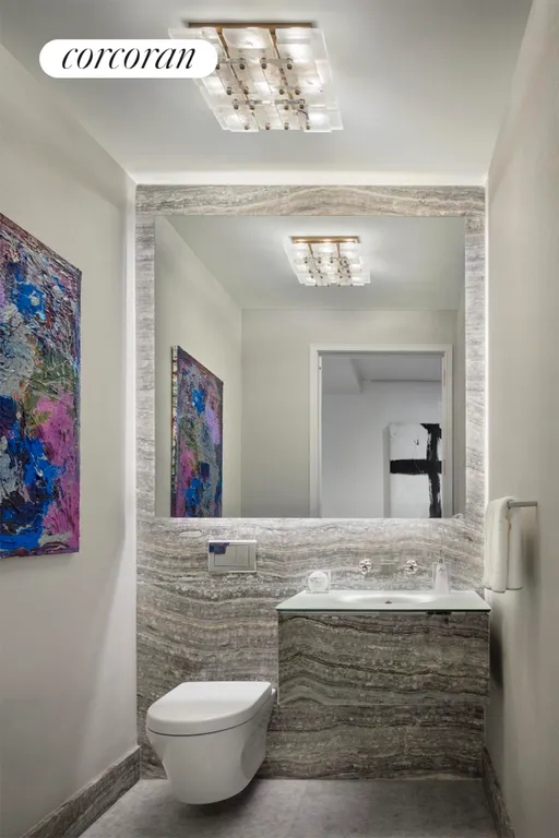 New York City Real Estate | View 35 Hudson Yards, 6103 | Onyx-clad powder room | View 10