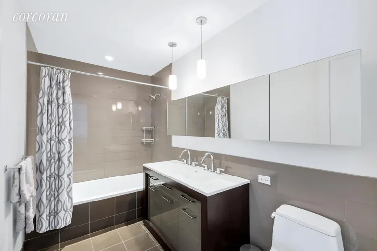 New York City Real Estate | View 125 North 10th Street, S4F | Large Bathroom w/Deep Soaking Tub and Double Sink | View 6