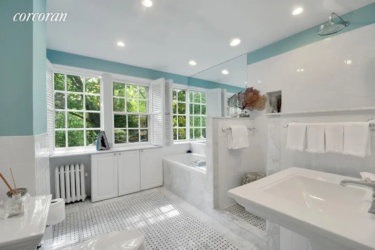 New York City Real Estate | View 34 Greenway Terrace | A Lush Windowed Bathroom | View 8