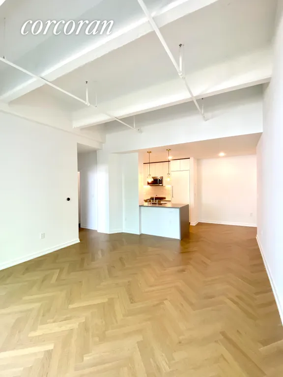 New York City Real Estate | View 184 Kent Avenue, A314 | great room, window towards entry and kitchen | View 6