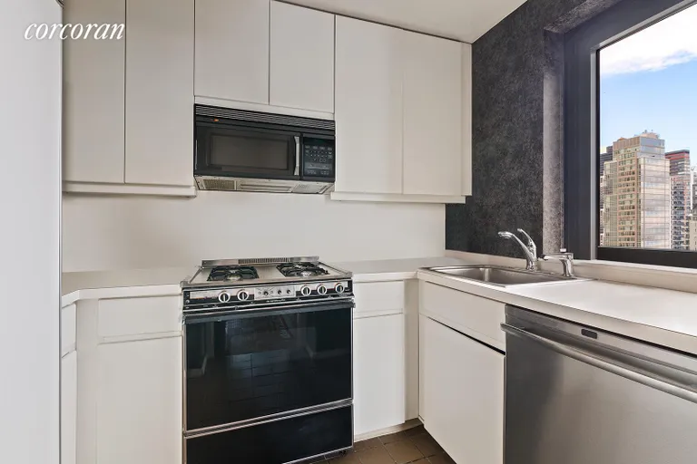 New York City Real Estate | View 100 United Nations Plaza, 24A | Windowed kitchen | View 4