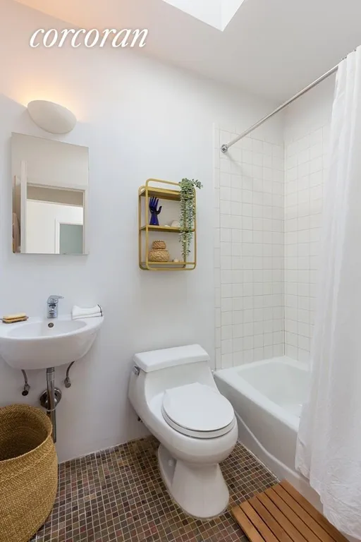 New York City Real Estate | View 110 Clinton Avenue, 3A | Bathroom with skylight | View 8