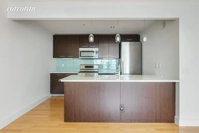 New York City Real Estate | View 509 48th Avenue, 5A | Gourmet kitchen | View 3