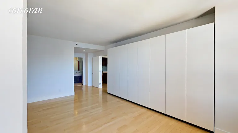 New York City Real Estate | View 509 48th Avenue, 5A | Wall of closets and walk-in closet | View 7