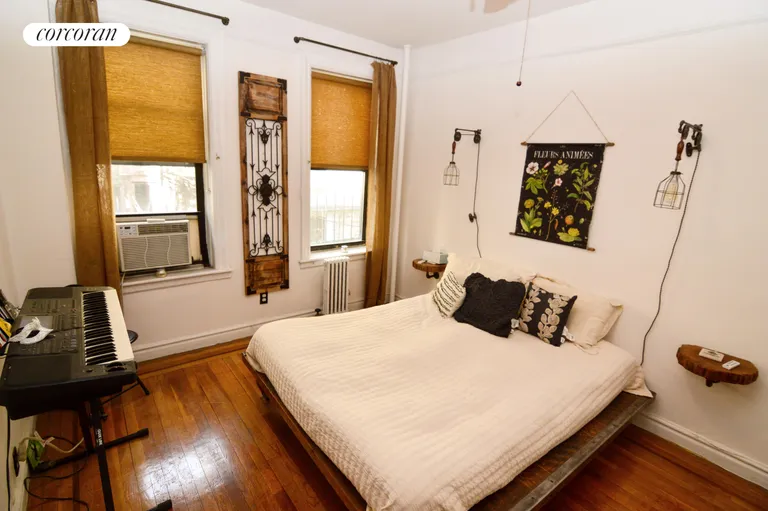 New York City Real Estate | View 315 East 77th Street, 1F | Bedroom with Queen Size Bed | View 2