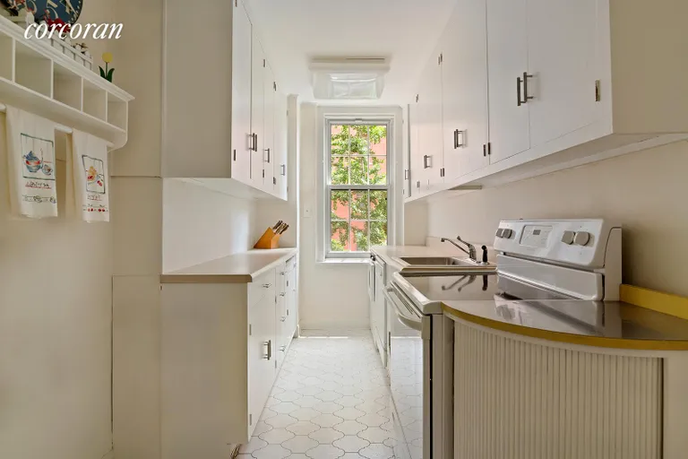 New York City Real Estate | View 160 Henry Street, 4D | Windowed Kitchen with Washer and Dryer | View 5