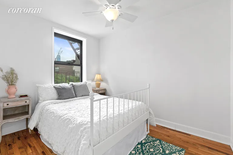 New York City Real Estate | View 165 Christopher Street, 4H | Sunny Bedroom with Downtown Views | View 5