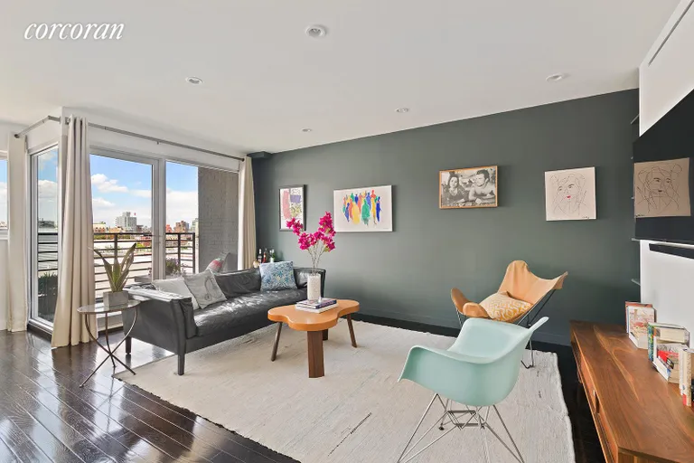 New York City Real Estate | View 48 Box Street, 6 | Light-filled living room with balcony | View 2