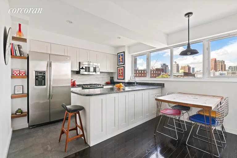 New York City Real Estate | View 48 Box Street, 6 | Pretty open kitchen with a wall of windows | View 4