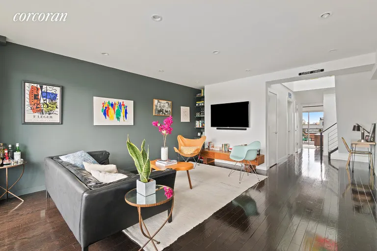 New York City Real Estate | View 48 Box Street, 6 | Living room with high ceilings beyond in entry | View 5