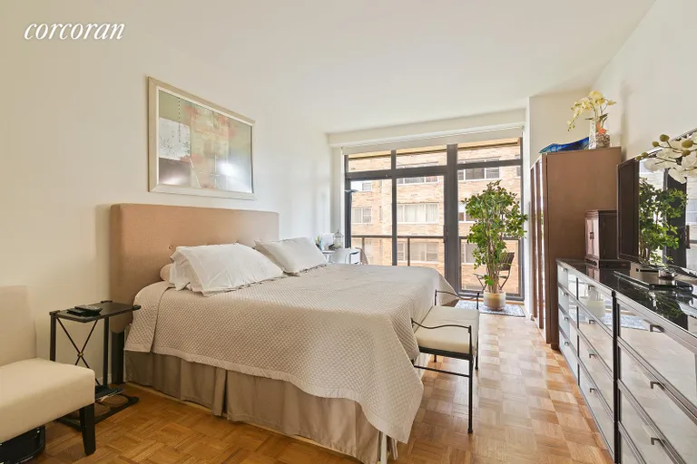 New York City Real Estate | View 100 United Nations Plaza, 8E | Master bedroom with private balcony | View 3