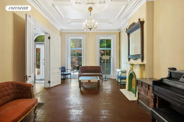 New York City Real Estate | View 184A Bergen Street | Front parlor has period plaster work | View 2