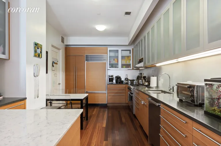 New York City Real Estate | View 30 West Street, 3A | Chef's Kitchen with Incredible Storage | View 3