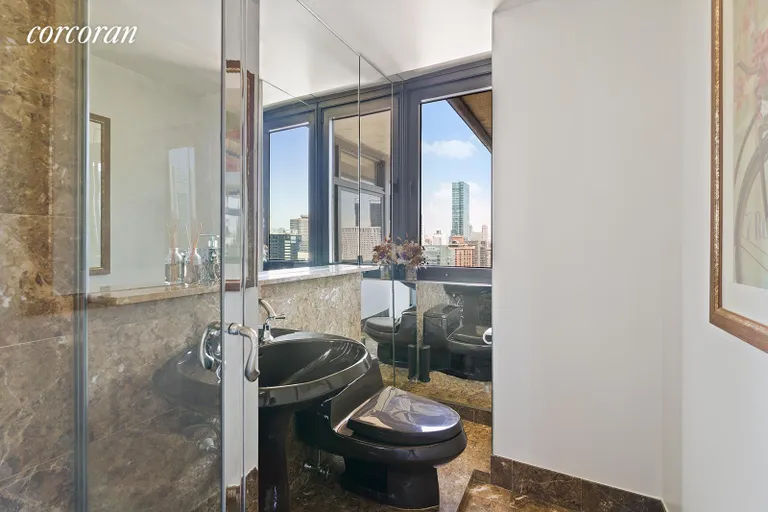 New York City Real Estate | View 100 United Nations Plaza, 37E | Windowed second bathroom with shower | View 7
