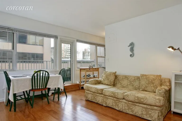New York City Real Estate | View 153 East 57th Street, 18A | Living Room / Dining Room | View 2