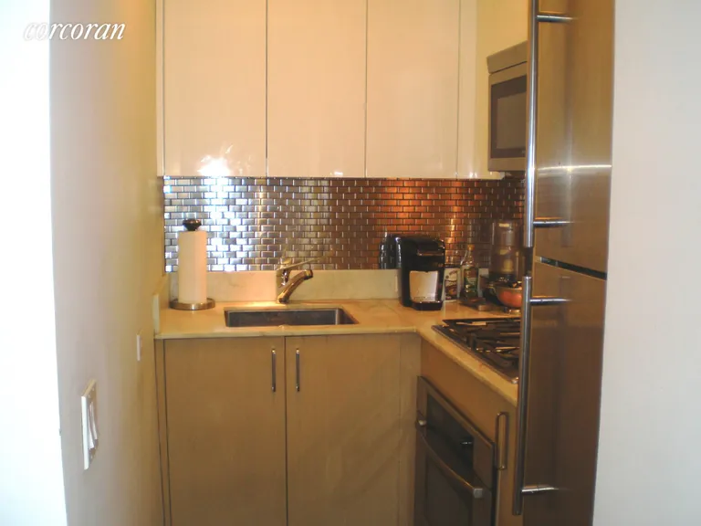 New York City Real Estate | View 211 East 51st Street, 8D | 8D-Kitchen | View 4