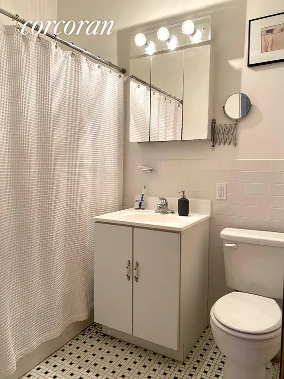 New York City Real Estate | View 7618 69th Place, 2A | 2nd bath with full tub | View 8
