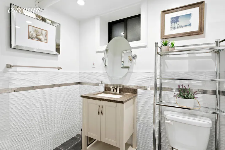 New York City Real Estate | View 382 Prospect Place, 5 | This lively and pretty bathroom is downstairs. | View 8