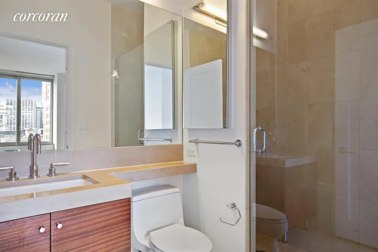 New York City Real Estate | View 30 West Street, PH2C | Marble Master Bathroom | View 6