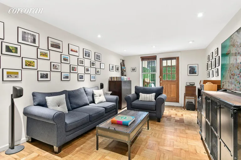 New York City Real Estate | View 245 Henry Street, 1A | Spacious living room fits living and dining | View 2