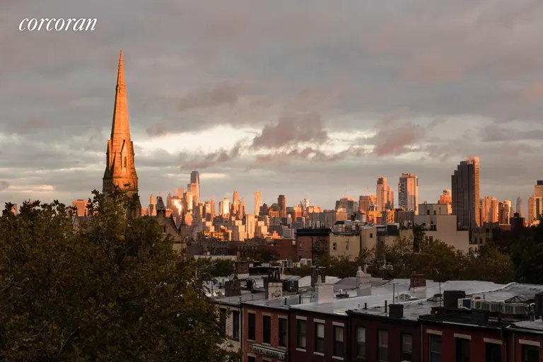 New York City Real Estate | View 140 8th Avenue, 6R | Dusk from the bedroom windows is stunning. | View 8