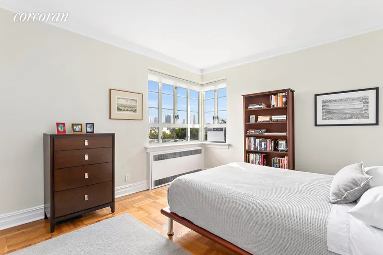 New York City Real Estate | View 140 8th Avenue, 6R | The bedroom has corner windows with skyline views. | View 5