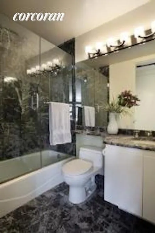 New York City Real Estate | View 401 East 84th Street, 3B | Marble Bathroom | View 5