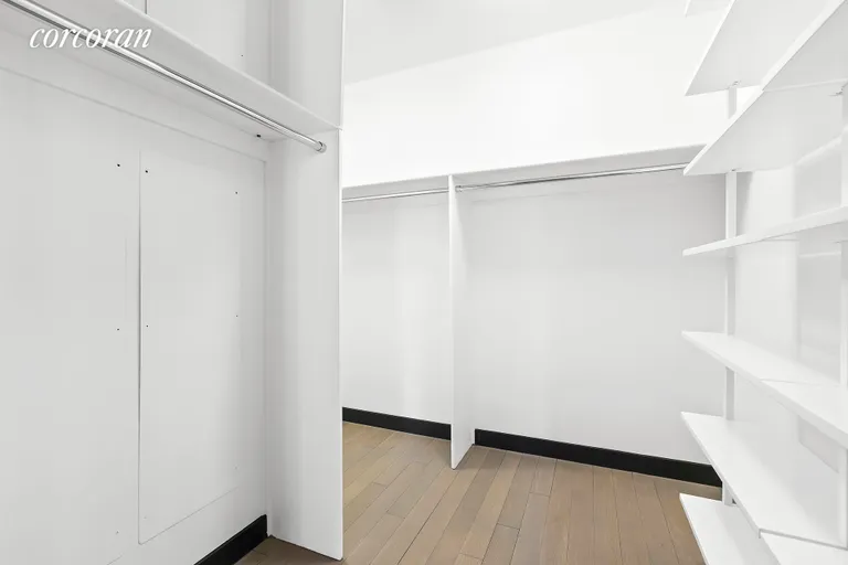 New York City Real Estate | View 157 West 57th Street, 37F | Walk-in Closet | View 11